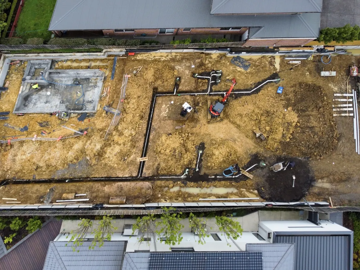 Aerial view of a new-home site dug out with the new drainage runs laid