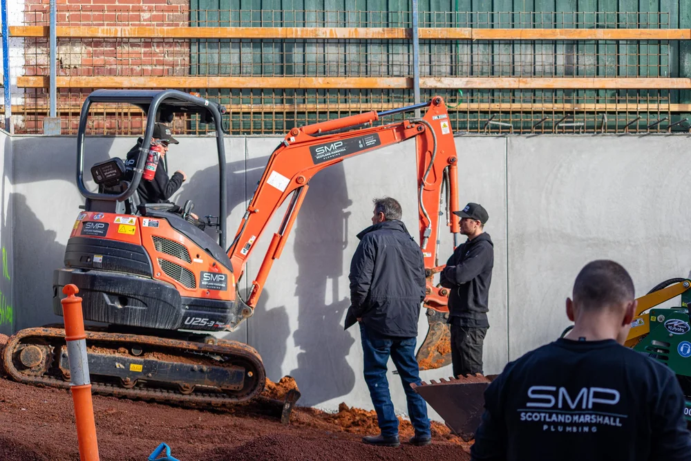 SMP crew overseeing drainage excavation at Kooyong Road